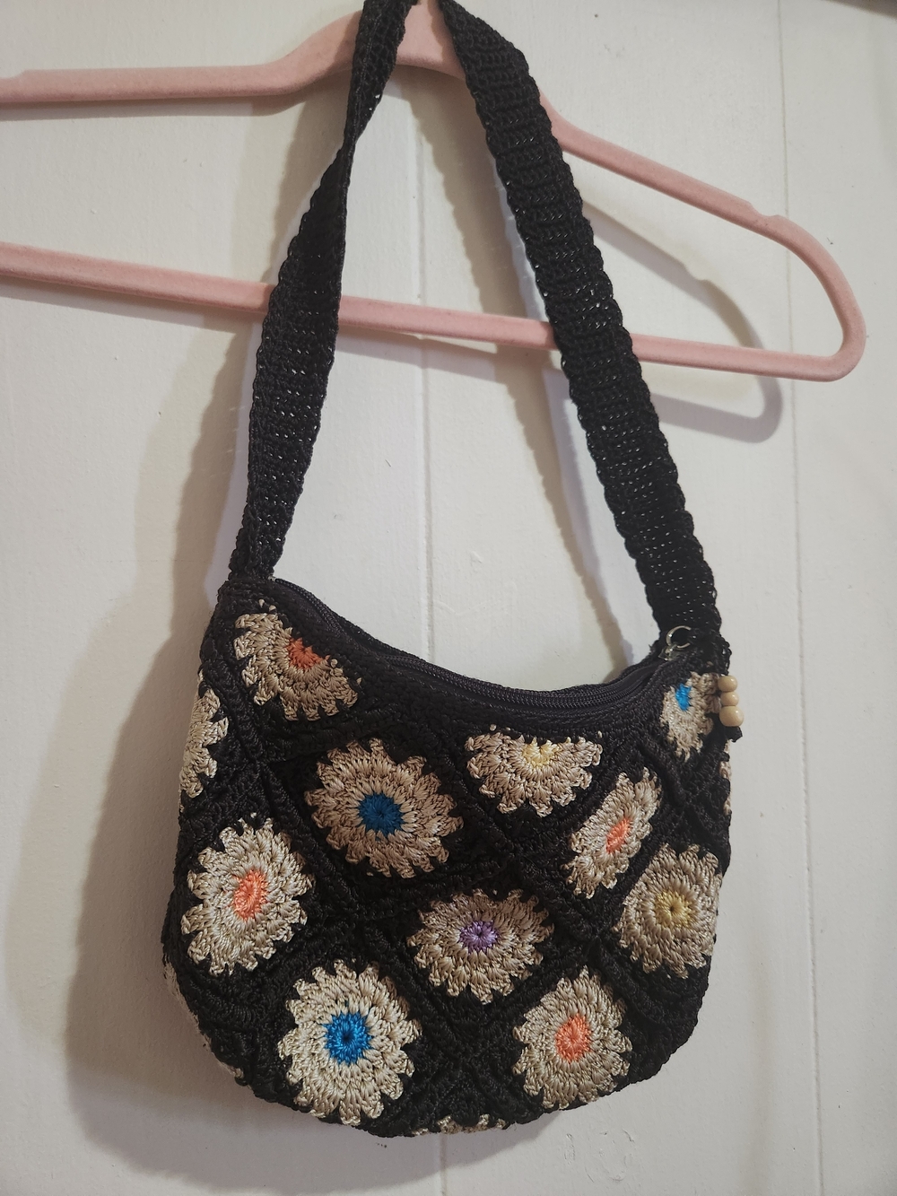 The Sak Black Crochet Shoulder Bag with Multicolor Floral Accents
